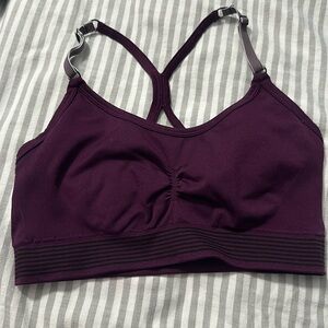 Victoria’s Secret purple and black trim sports bra size large!